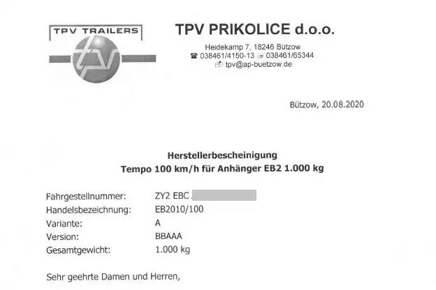 Foto eines Dokuments mit Firmenlogo 'TPV TRAILERS', &Uuml;berschrift 'TPV PRIKOLICE d.o.o.', Datum 'B&uuml;tzow, 20.08.2020', Titel 'Herstellerbescheinigung Tempo 100 km/h f&uuml;r Anh&auml;nger EB2 1.000 kg', Tabelle mit den Feldern 'Fahrgestellnummer', 'Handelsbezeich
