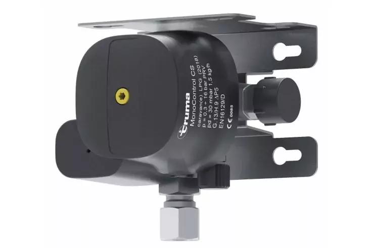 Schwarzes rundes Geh&auml;use mit aufgesetzter Metallhalterung, gelbem Punkt, Einstellknopf, wei&szlig;er Beschriftung und sichtbarer Schraubenmutter unten