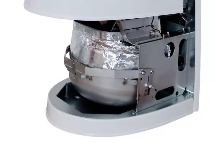 Wei&szlig;e Au&szlig;enverkleidung eines ge&ouml;ffneten Ger&auml;ts, innen Metallgeh&auml;use, runde Edelstahlsch&uuml;ssel teilweise mit Aluminiumfolie umwickelt, Metallhalterungen und sichtbare Kabel, wei&szlig;er Sockel