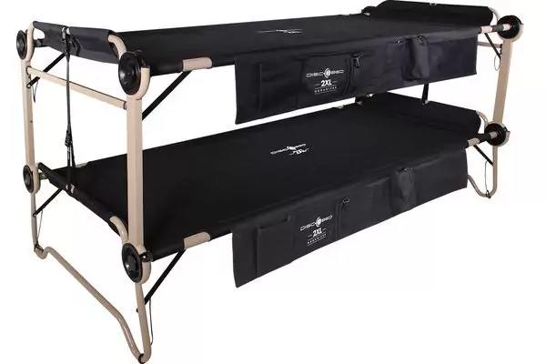 Zweiteiliges, klappbares Metallgestell in Beige mit zwei schwarzen Stofffl&auml;chen, vorderen Taschen und runden Verbindungsrollen