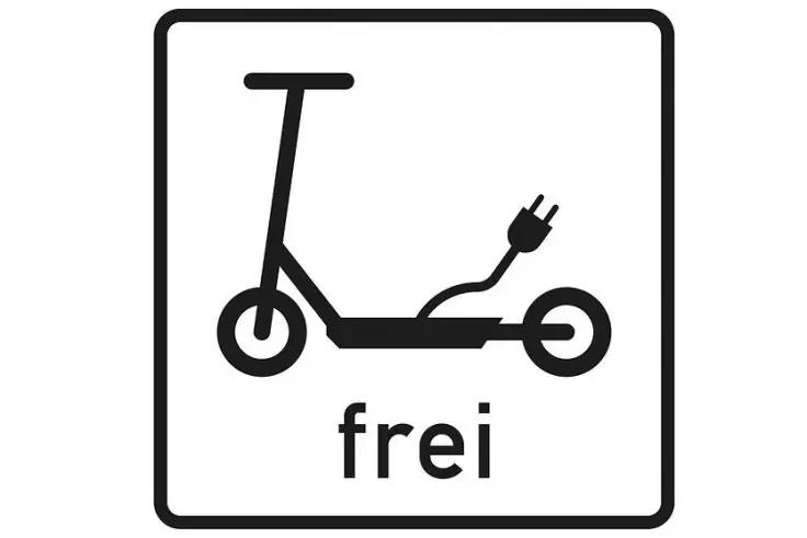 Quadratisches Schild mit abgerundeten Ecken und schwarzem Rand, schwarzes Piktogramm eines Rollers mit Stecker und dem Wort 'frei' darunter
