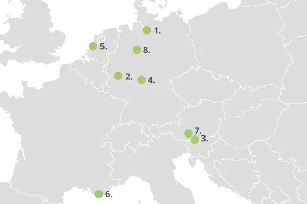 Graue Karte Europas mit acht gr&uuml;nen, nummerierten Punkten 1&ndash;8 an verschiedenen Positionen