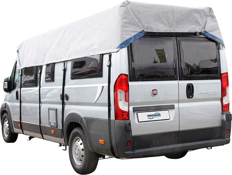 Silberner Kleinbus mit wei&szlig;em Planendach, seitlichen Fenstern und roten R&uuml;ckleuchten