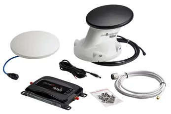 Due dischi rotondi (uno bianco, uno nero), un componente rettangolare nero con scritta, vari cavi, un cavo coassiale bianco con connettore metallico e un piccolo sacchetto di plastica con viti