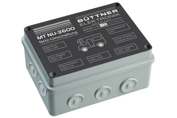 Involucro elettronico rettangolare grigio con etichetta nera, testo bianco 'B&Uuml;TTNER ELEKTRONIK', modello 'MT NU-3600', tre pressacavi rotondi sul davanti