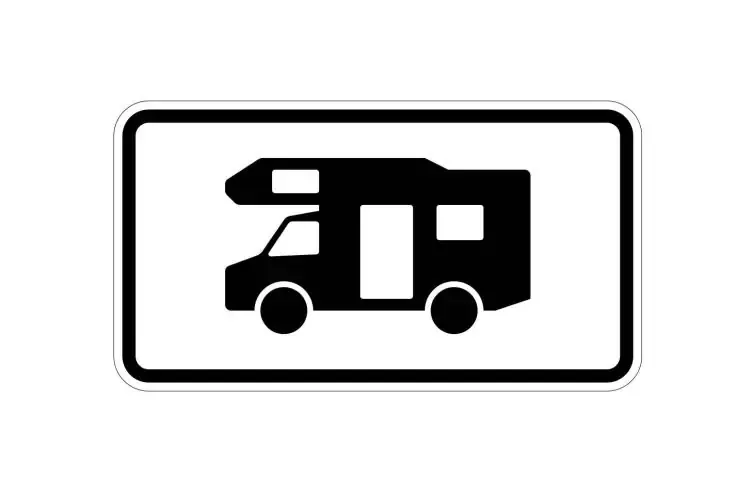 Rechthoekig bord met zwarte rand en zwarte silhouet van een camper, zijaanzicht naar links met opbouw boven de cabine, deur en twee wielen