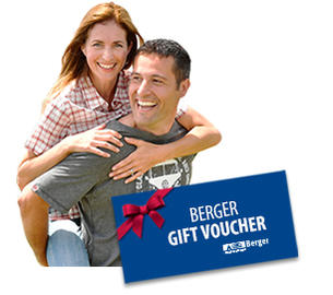 Smiling couple with gift voucher