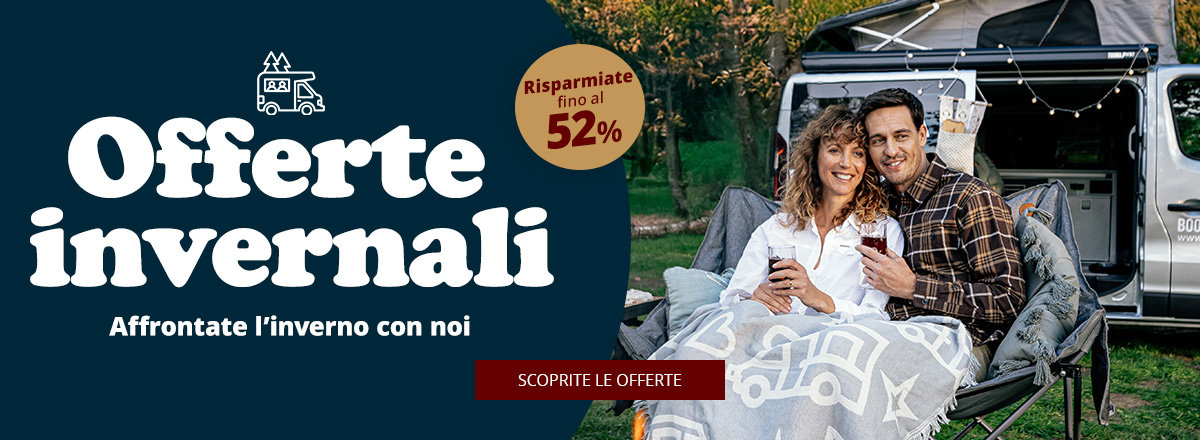 Due persone sono sedute nel retro aperto di un camper, sotto una coperta con silhouette di camper bianche; a sinistra sfondo scuro con il testo grande 'Winter Deals', testo più piccolo 'Mach dich bereit für den Winter', badge rotondo 'bis zu 52% sparen' e pulsante rosso 'Zu den Angeboten'. Erba e alberi sullo sfondo