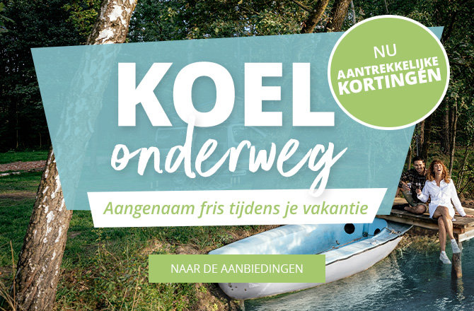 Houten bord met de tekst Kühl unterwegs in een groen landschap