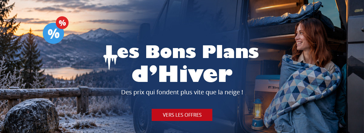 Paysage de montagnes enneigées avec un lac à gauche, personne avec couverture près d'une porte de camping-car ouverte à droite, texte "Winter Deals", icônes pourcentages et bouton rouge "Zu den Angeboten"