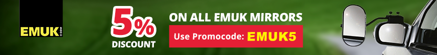 Lawn mower on green grass with promotional offer