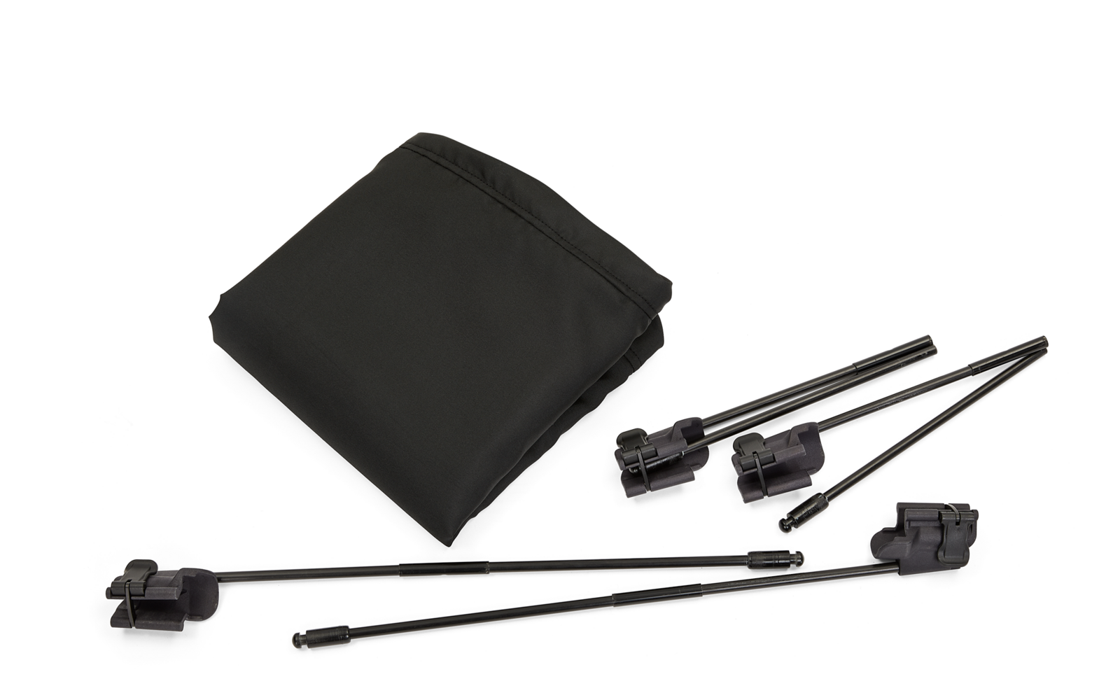 Schwarze Stativbeine mit kleinen Klemmen und eine schwarze Tragetasche