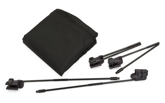 Gambe del treppiede nere con piccole clip e una borsa nera per il trasporto