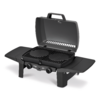 Small black tabletop grill with open lid, two round cooking grates, two front control knobs and folded-out side shelves