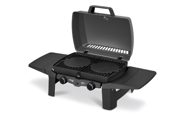 Small black tabletop grill with open lid, two round cooking grates, two front control knobs and folded-out side shelves