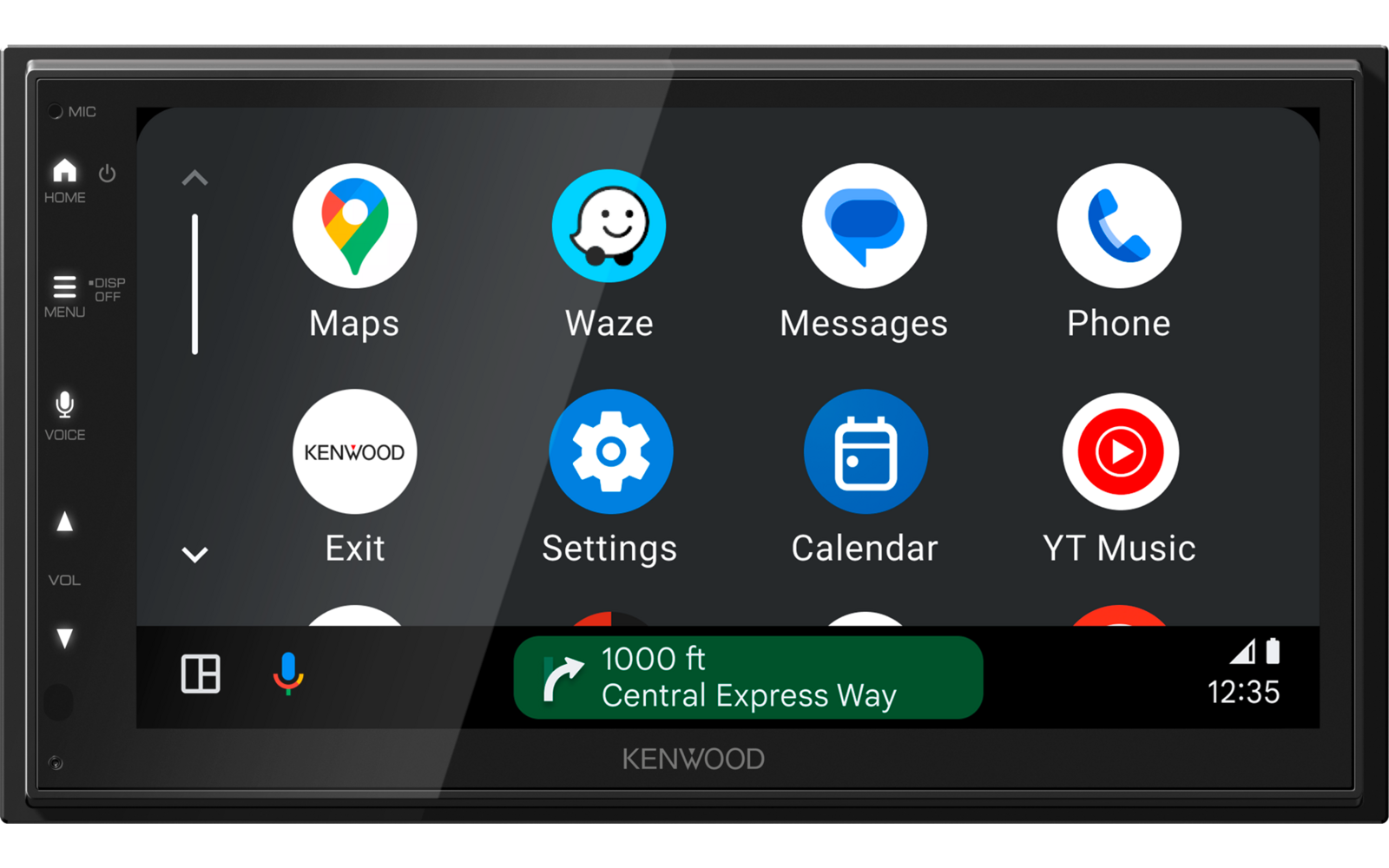 Zwart touchscreen met app-pictogrammen (Maps, Waze, Messages, Phone, Kenwood, Exit, Settings, Calendar, YT Music), groene navigatiebalk "1000 ft Central Express Way", merknaam "KENWOOD" en tijd "12:35"