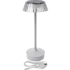 Tischlampe mit rundem weißem Sockel, dünnem grauem Stab, transparentem geriffeltem Lampenschirm und weißem Kabel mit USB-Stecker daneben
