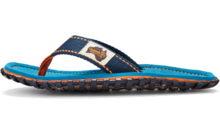 Side view of a blue flip-flop with a dark blue strap, turquoise insole, and brown logo patch