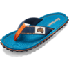 Blue flip-flop with turquoise footbed, dark blue strap with orange trim, visible 'Gumbies' label and black notched sole