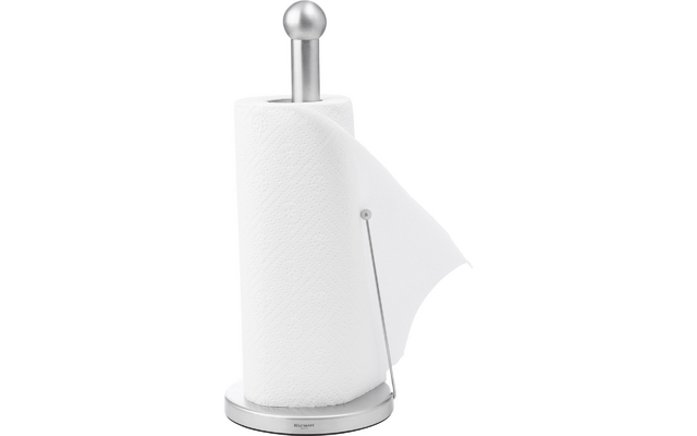Rotolo di carta da cucina su un supporto metallico argentato con base rotonda, asta verticale e braccio di supporto laterale