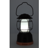 Une lanterne noire avec une lumière blanche brillante