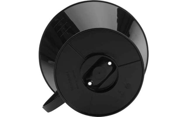 Black, round underside of an object with a glossy surface, two metal contacts visible in the center and a handle at the side