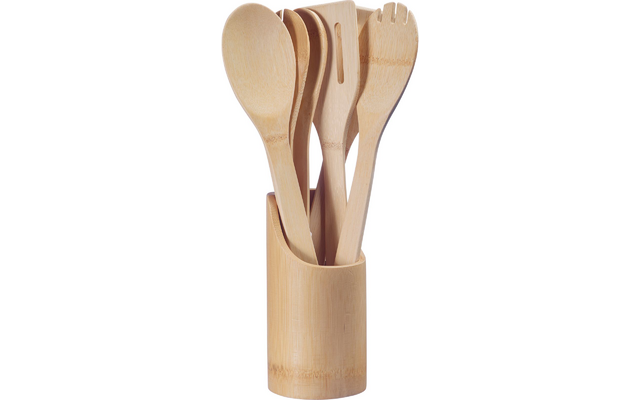 Bamboo utensils (spoons, spatula, fork-like utensil) in a round bamboo holder