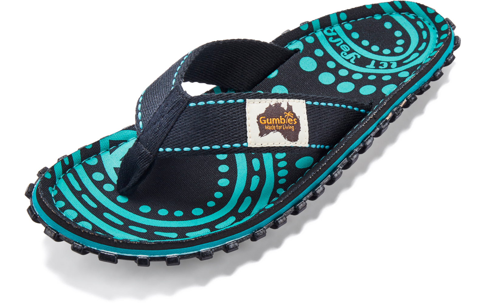 Single black and turquoise flip-flop with circular dot pattern, black fabric toe thong and small rectangular fabric label