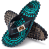 Two overlapping flip-flops with black thong strap, turquoise-and-black dot-and-circle pattern on the footbed, beige brand label on the strap, rugged sole with square tread pattern