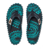 Two turquoise and black flip-flops with dotted and wavy patterns, top view, "Gumbies" text visible on the right sandal