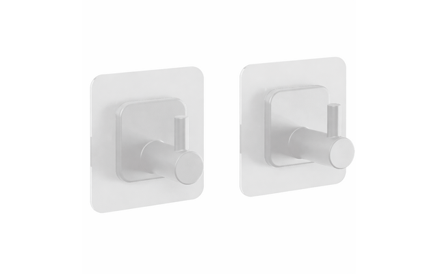 Zwei silberne Haken mit rundem Stift auf durchsichtigen quadratischen Platten