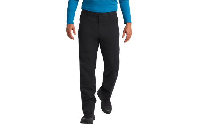 Person trägt schwarze Hose und blaue Jacke
