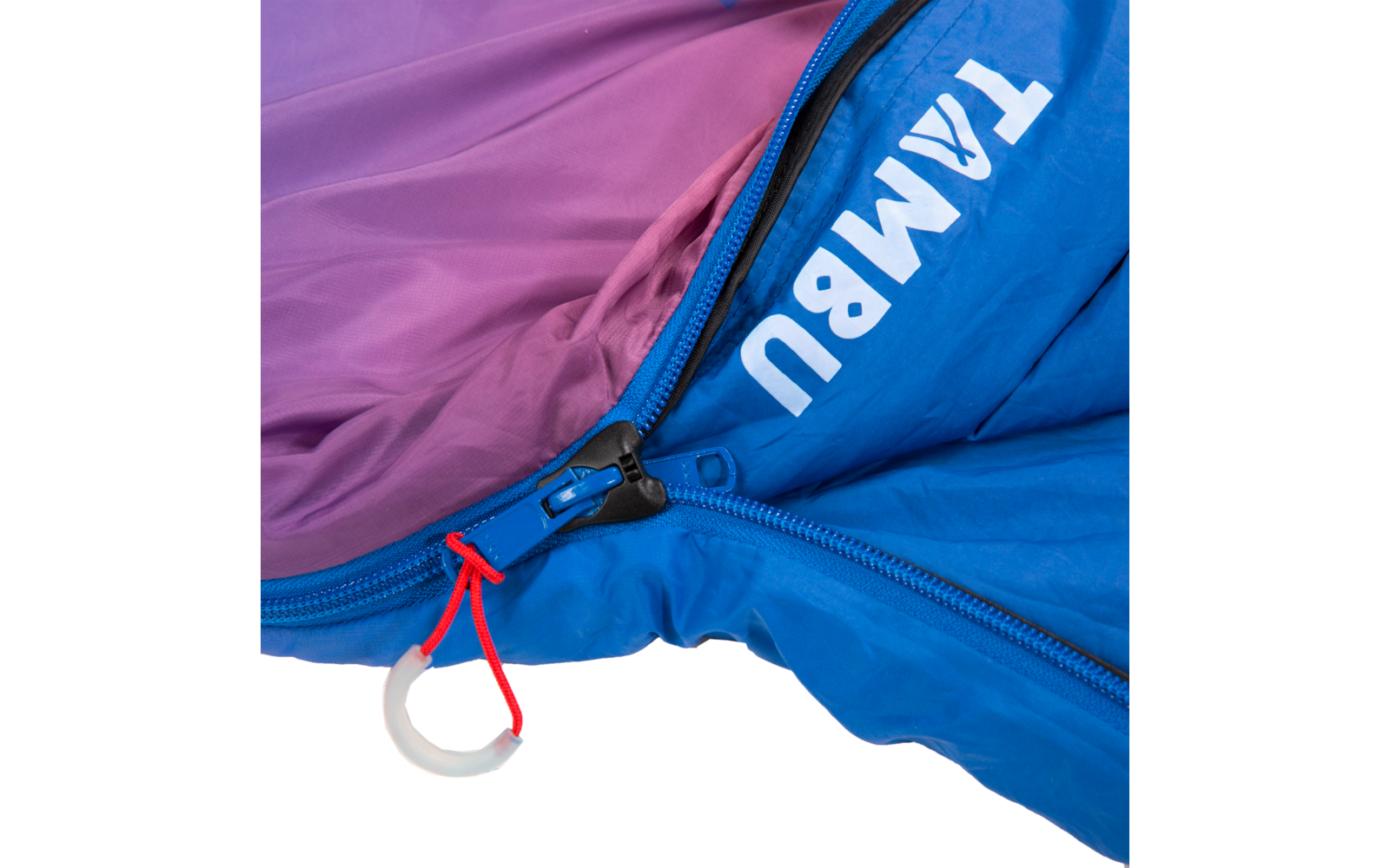 Close-up of a blue sleeping bag with purple interior, partially open zipper, red pull cord with white plastic ring