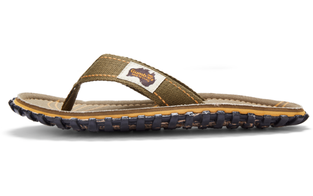 Side view of a single flip-flop sandal with a green fabric strap, small logo patch on the strap, stitched beige footbed and black treaded outsole
