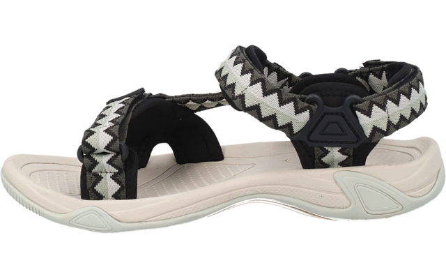 Eine einzelne Sandale mit hellbeiger Sohle, schwarzen Riemen mit weiß-grauem Zickzackmuster und Klettverschlüssen