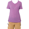 Woman standing facing camera against white background, wearing purple V-neck T-shirt with small floral print, beige pants, hair tied back, hands at sides