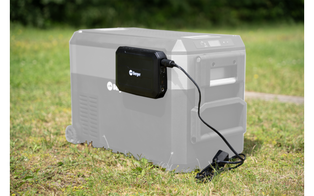 Generador portátil negro sobre hierba