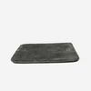 Rechteckige dunkelgraue Plüschmatte auf weißem Hintergrund