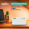 Weißer Cello-Router mit Markenlogo und kleinen Kontroll-LEDs auf einem Holztisch, links ein aufgeklappter Laptop, rechts ein Topf mit Sukkulente, orangefarbene Wand im Hintergrund sowie der sichtbare Text 'Wi‑Fi 6 Dual‑Band', '2,4/5 GHz' und UK-, EU-