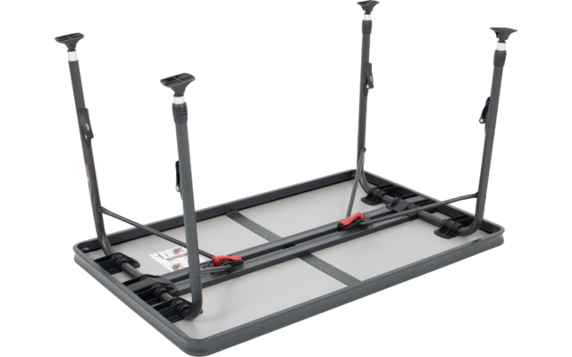 Umgedrehter schwarzer Tisch mit vier ausziehbaren Metallbeinen