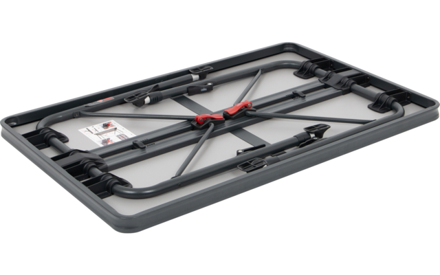 Dunkle Metallplatte mit vier Zungen auf weißem Hintergrund