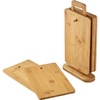Five rectangular bamboo cutting boards; two lie flat, three stand in a rack with a handle; each board has a round hole near the top