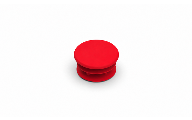 Objet rond rouge composé de deux disques empilés sur fond blanc