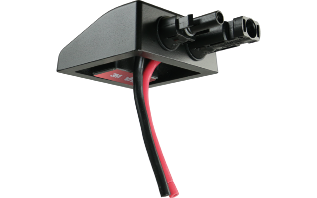 Schwarzes Kunststoffgehäuse mit zwei runden Steckbuchsen, zwei Kabeln (rot und schwarz) und einem roten 3M-Klebepad an der Unterseite