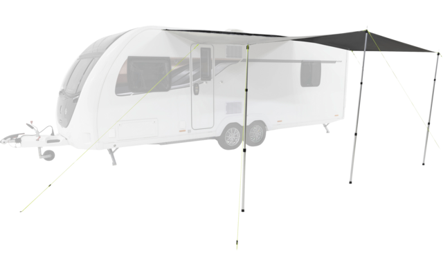 White caravan with extended awning, four support poles and guy lines