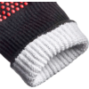 Gros plan d'un gant en tricot noir avec des picots rouges en caoutchouc et un poignet côtelé blanc
