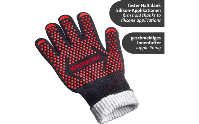 Gant noir avec pastilles en silicone rouges, inscription rouge 'WESTMARK' sur la paume, bord blanc-gris rayé, deux bulles de texte grises à droite avec les textes 'fester Halt dank Silikon-Applikationen', 'firm hold thanks to silicone applications', 'geschmeidiges Innenfutter' et 'supple lining'