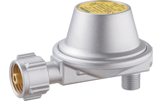 Silver round metal device with a yellow label on top, a side threaded connector with a nut, and a short threaded outlet at the bottom, on a white background