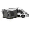Camper bianco con annesso/telo grigio fissato, tre finestre scure e tiranti verde lime
