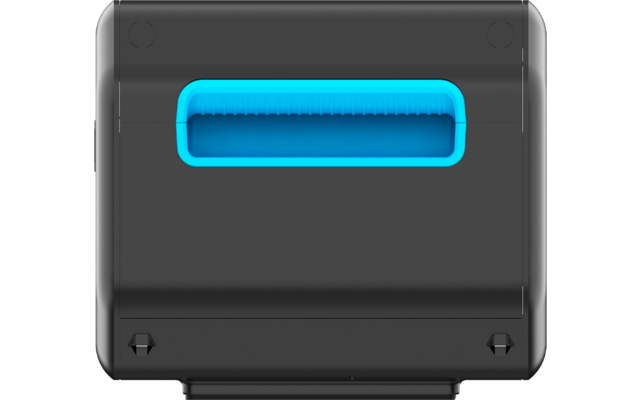Dark gray rectangular plastic object with a centered turquoise rectangular recessed opening near the top and two small black triangular elements at the bottom